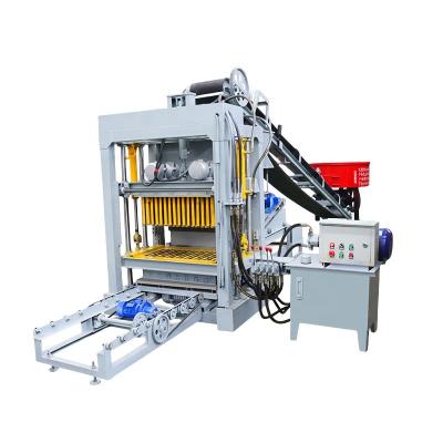 China Construction Works Large Hydraulic Cement Brick Machine with Permeable Brick Molds for sale