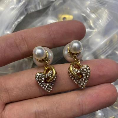 China 2022 popular brands of designer romantic earrings 925 steel earrings necklaces jewelry wholesale silver statement earrings for sale