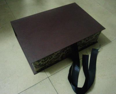 China Special design flat packed rigid paper folding box with silk ribbon for sale