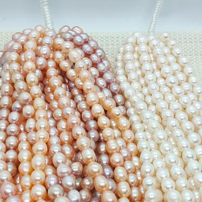 China Pearl purple, freshwater pink, and white rice-shaped 8-9mm freshwater pearl loose beads can be used to make all kinds of pearl jewelry for sale