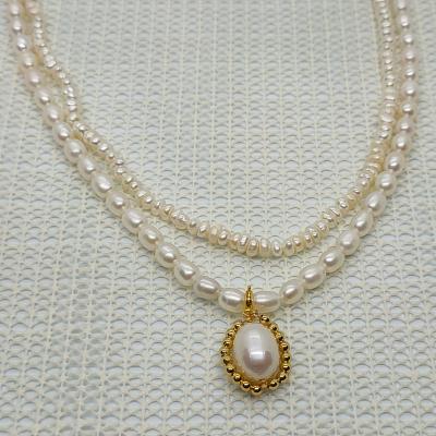 China FASHIONABLE factory direct double layer different types of freshwater pearl necklace ladies special pendant necklace for sale