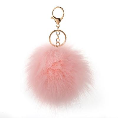 China Environmental protection the main chain accessories of the latest sale 12cm warm animal fur for daily use artificial fox pom-pom or raccoon pom-pom for sale