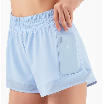 China Custom 2021 Running Shorts Womens Breathable Casual Sweated Casual Fit Workout Loose Fitted Shorts With Phone Pocket for sale