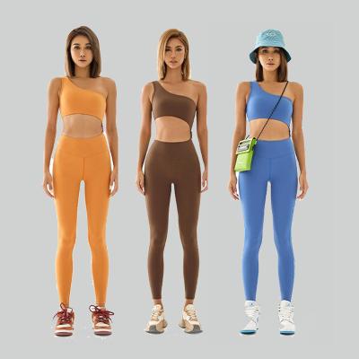 China New European and American style one-shoulder breathable detachable one-piece sports fitness suit female waist stretch yoga suit the top for sale