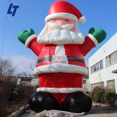 China Christmas Holiday 25Ft Superman Inflatable Santa Outdoor With Led Lights OEM For Christmas for sale