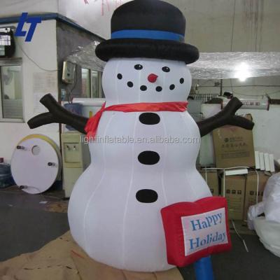 China Christmas Holiday Shivring Snow Singer Man Inflatable Snowman For Decoration With Light for sale