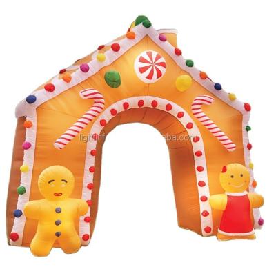 China Christmas Holiday Gingerbread House 10ft Large Inflatable Christmas Arch With Built-in LED Lights for sale