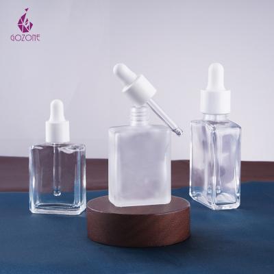 China Rectangle Square Shape Cosmetic Oil Frosted 15ml Essential Oil 30ml Clear Glass Dropper Bottle for sale