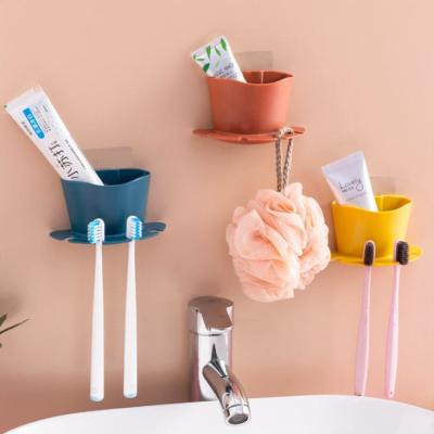 China Modern Multifunctional Plastic Bathroom Toothpaste Suction Cup And Toothbrush Cup Shelf Holder ZGJ-0752 for sale