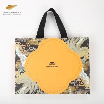 China Materials Xiaoyin Factory Supply Packaging Bag Logo Printing Shopping Bags High Quality Reused Custom Paper Bags for sale