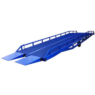 China Mobile Hotels 12t Truck Container Loading Dock Ramps Hydraulic Cargo Ramp Hydraulic Loading Bridge for sale