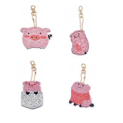 China Promotion gift around diy diamond embroidery pig shape 5d diamond painting hanging pink key for sale