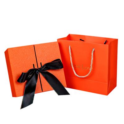 China Newest Valentine's Day Orange Gift Box Creative Jewelry Knot Wedding Box Birthday Gift Packaging Box for sale