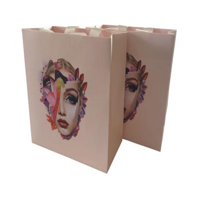 China High Quality Biodegradable Hot Stamping Glossy Matte Clothing Paper Bag For Shopping for sale