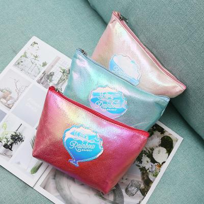 China Fashion ins cosmetic bag lady bag shell laser bag storage bag waterproof portable handheld dumplings wash cosmetics for sale