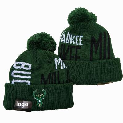 China Best COMMON Quality Slapped Beanies With Jacquard Logo Pom Pom Knitted Basketball Caps Bucks Laker Fans Beanie Hats for sale