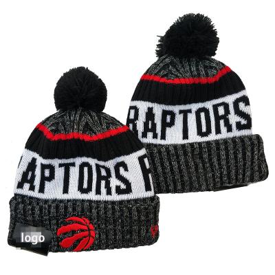 China Jacquard COMMON Logo Cuffed Beanie Hat With Pom Pom Knitted Winter Basketball Caps Laker Raptor basketball beanies for sale