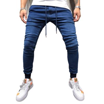 China Breathable Stacked Stretch Jeans Pants Mens High Waist Drawstring Pencil Pants Solid Color Mens Athletic Jeans for sale