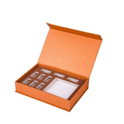 China Recyclable Custom Folded Book Box Magnetic Book Shaped Rigid Paper Box Packaging Magnetic Gift Boxes With EVA Foam Insert for sale