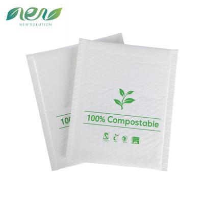 China 100% XMC Biodegradable Shipping Packaging Padded Envelope Printed Compostable Bubble Mailers With Logo for sale