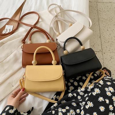 China New Fashion Small Flap Cross - Body Bags For Women Purse Pearl Design Solid Color Wooden Handbags for sale