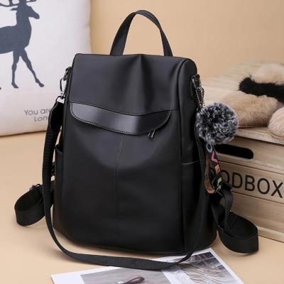 China Waterproof Fashion Waterproof Bags Women Girls Backpack School Backpack Travel Bag With Hairball for sale