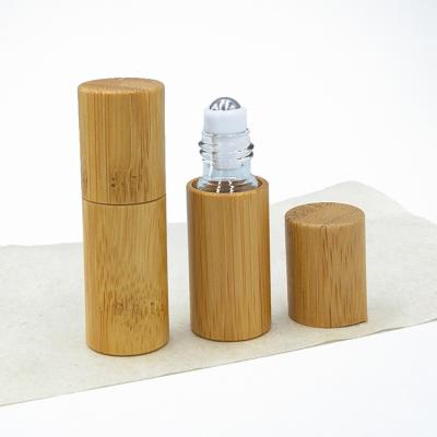 China 5Ml Glass Eye-Friendly Essential Oil Roller Bottle Bamboo Roll On Bottle With Bamboo Cap for sale