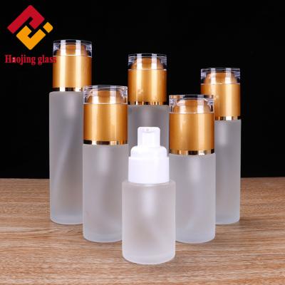 China e-friendly custom cosmetic round base empty frosted lotion bottle with pump packaging for sale