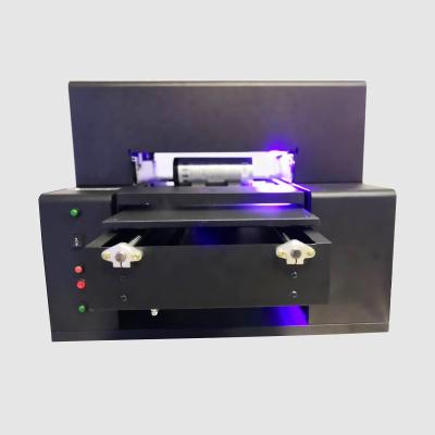 China UV Printer Textile Printing Machine A3 Printing Stores Direct To Garment Printer DTG T-shirt Printer for sale