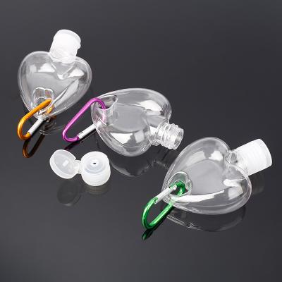 China BEAUTY PACKAGING 50Ml Mini Customized Transparent Heart Shape Petg Key Chain Hand Sanitizer Bottle for sale