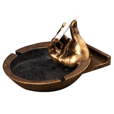 China Universal Art Model Ashtray Modern Portable Home Decor Phone Holder Living Room Office Decor Gift Funny Character Stone Finger for sale