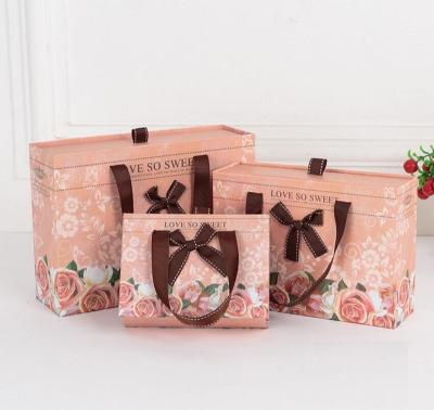 China Hard Paper Drawer Type Recyclable High Grade Mounted Gift Box Wedding Return Gift Bag Wholesale for sale