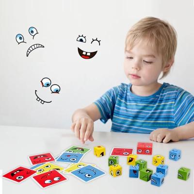 China 2022 Cartoon Toy Face Changing Interactive Magic Cube Game Kids Building Wooden Puzzle Blocks Logical Thinking Training Toys for sale