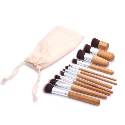 China 11 Pcs Real Travel Flat Brush Professional Bamboo Wooden Makeup Brush Set Cosmetic Makeup Brushes for sale