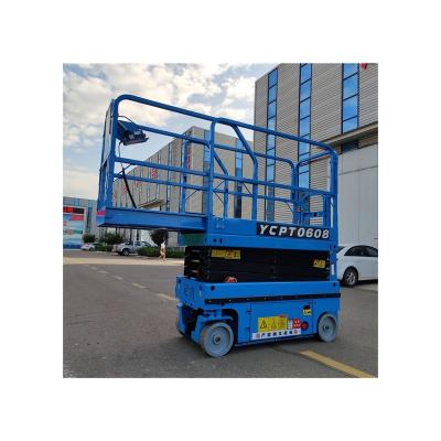 China Hotels Lifting Height Skylift Mobile Hydraulic Electric Scissor Lift Platform With Solid Tire for sale