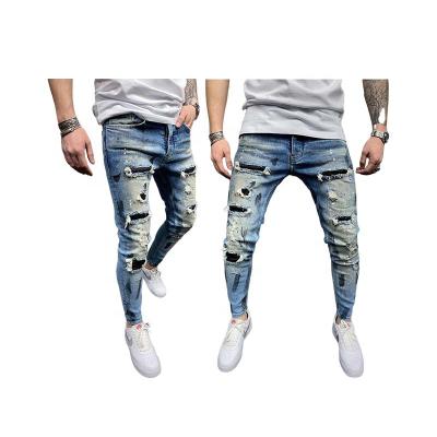 China New style European and American men's jeans men's breathable paint jeans skinny ripped hole washed jeans pants for sale