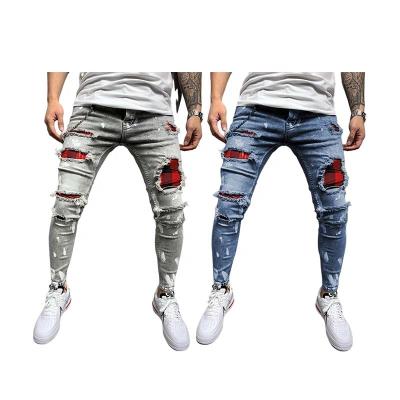 China Hot Selling Breathable Paint Mens Jeans New Design Ripped Hole Jeans Slim Fit Straight Mens Pants Jeans for sale