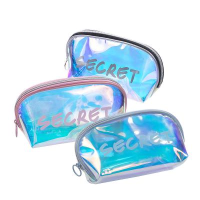 China Fashion Small Holographic Makeup Bag Clear Travel Toiletry Bags Waterproof Cosmetic Bags Fashion Laser Makeup Pouch for sale