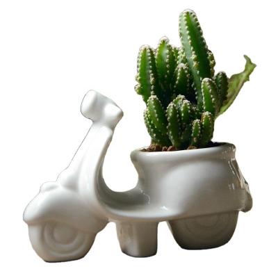 China Europe Tc002 Mini Ceramic Art Ornaments Flower Pots Motorcycle Shape Decor Planters Ceramic Pot for sale