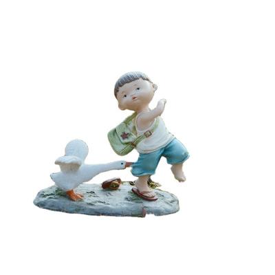 China Z16001A Europe Vain Pursuit Boy Funny Product Decorative Resin Crafts Handsome for sale