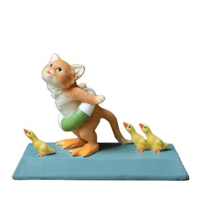 China Europe Z15476A Mini Yellow Ducks With Cat Animal Figurine Desktop Decoration for sale