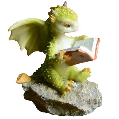 China Europe Z15373A Dragon Sitting On The Stone Animal Miniature Decor Dragon Figurine Gift Resin Figure for sale