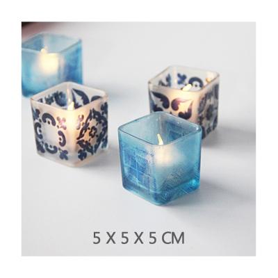 China New Design Transparent Matte Colored Glass Square Shaped Candle Jars Wholesale Glass for sale