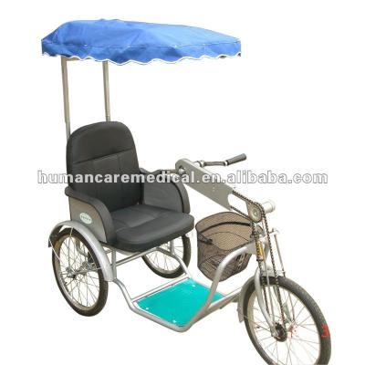 China Other CE manual tricycle wheelchair with sunshade hot sale in 2012 for Christmas for sale