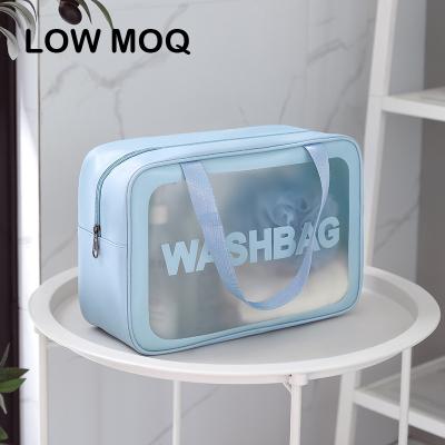 China Lady Blue Makeup Bag Zipper Handle Travel Cosmetic Wash Bags for sale