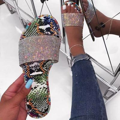 China Massage Rhinestone Slippers Women New Shape Wild Bottom Flip Flop Bright Diamond Flat Beach Outdoor Wild Student Sandals for sale