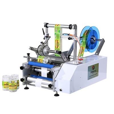 China Whole Electric Semi Automatic Desktop Food Factory Price Round Bottle Labeling Machine for sale