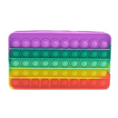 China Schools & Newest Offices Silicone Pencil Case Storage Bag Student Supplies Push Pop Pencil Case for sale