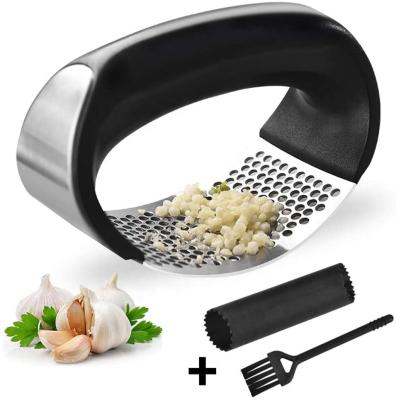 China Amazon Low MOQ Stainless Steel Garlic Mincer Garlic Cutter Kitchen Tools Viable Hot Garlic Press For Dishwasher Safe for sale