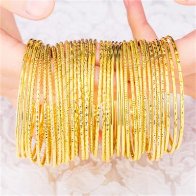 China 24K Gold Circle Design Jewelry Bangle Brass Plated Bridal Bracelet Fashion Casual/Sporty Bangle For Women for sale